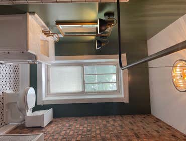 Custom Bathroom Remodel 2 Refinish tub, install tile shower surround, install new vanity, install brick veneer wall.