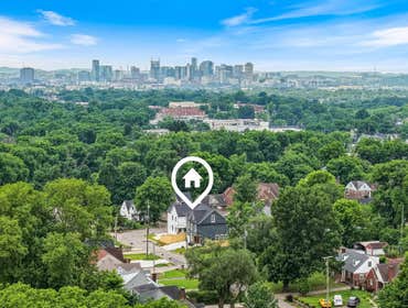 Aerial view showing proximity to downtown Nashville from 1135 Delmas Ave, East Nashville; quiet street with city convenience home by CJMC Build.