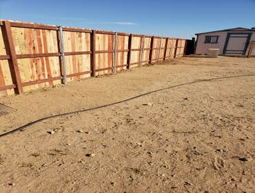 Redwood Fence Finish install a 6ft h redwood fence. Reinforce panels.