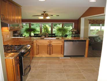 The Minicozzi Kitchen The Minicozzi kitchen was a re-design and re-model to give the homeowner's more cabinet storage and counter space. We removed th
