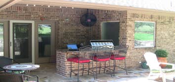 Cedar Garage Door and Backyard Kitchen