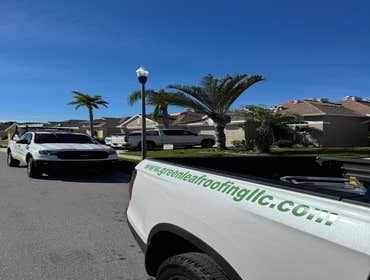 Photos by Green Leaf Roofing Working on shingle roof replacements in the HOA community