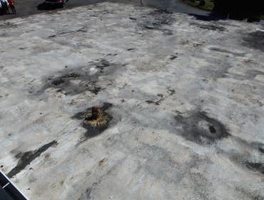 Isaac Roof Construction Commercial Roof Project Flat roof replacement with a minimum R-value of R-30 and a Class A Fire rating.
