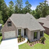 Photo(s) from Jenkins Homes, Inc. This home in Madisonville, LA is a 4 bedroom, 3 bathroom home in Autumn Creek Subdivision. This home has a spit floor