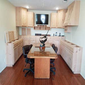 Custom built vent-a-hood, wine rack, and media shelf