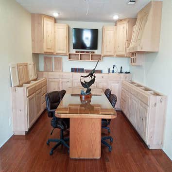 Custom built vent-a-hood, wine rack, and media shelf