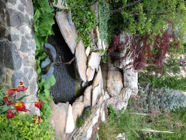 Larkin Landscaping Our landscape services entail total Installation of sprinkler systems, concrete work, water features, fire-pits, retaining walls, pa