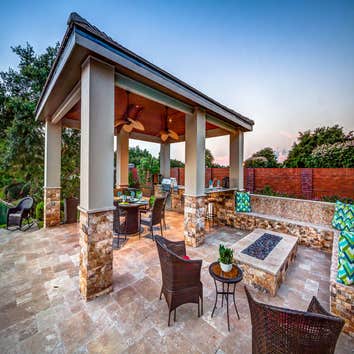 The Shapiro The cabana provides ample cooking and dining space to host gatherings for friends and family. The materials were selected to tie in as a na