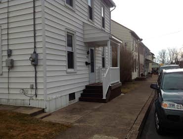 Project photos from Griesemer Construction The exterior of this porch was old deteriorated concrete with a aluminum posts & roof.Now it's trex lumber d