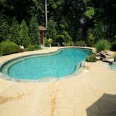 Photos from Crystal Blue Aquatics Llc New Construction of pool with full automation, LED lighting, high end travertine patio decking, beautiful water f