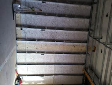 Photo(s) from T And C Drywall This is an apartment main office building.
-Furred out cement walls
-drywall
-texture