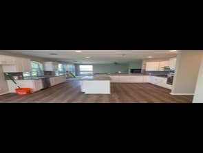 Photos by Seethere LLC #1 Kitchen Floors, Countertops, and Cabinets