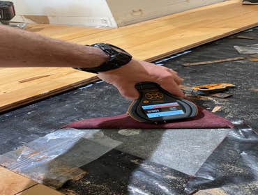 Checking moisture meter readings