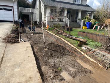 Photos by NW Regal Construction LLC #1 Driveway, retaining wall, and city sidwalk