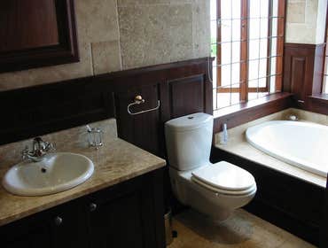 LAM Woodworks Here are some pictures of work done using different materials, from stained Mahogany to solid Bubinga or Beech, from Maple to Poplar for