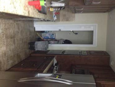 Bostic Kitchen,,FlOORS area , Utility room renovation Renovated Kitchen ,removal of floor tiles in living ,kitchen , utility room , family room and ha