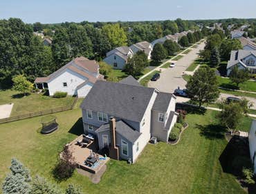 Photos by 614 Exteriors, LLC #30 Install new Atlas Pinnacle Black shingles and painted metal roof on bay window.