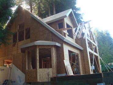 Duncan's Mills Custom Home Tore down old cottage on property located next to Russian River in Sonoma County, CA, did excavation work, and started groun