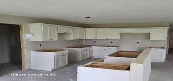 Cabinets Installing some cabinets today. These are white shaker-style cabinets made with real plywood and maple lumber, soft close hardware, dovetail d