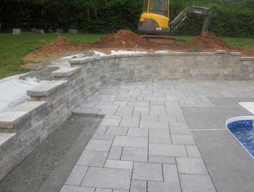 Photos by Dunn Landscape Construction #1 After initial pool installation provide all hardscape including retaining walls, pool deck, walkways and plant