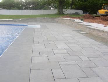 Photos by Dunn Landscape Construction #1 After initial pool installation provide all hardscape including retaining walls, pool deck, walkways and plant