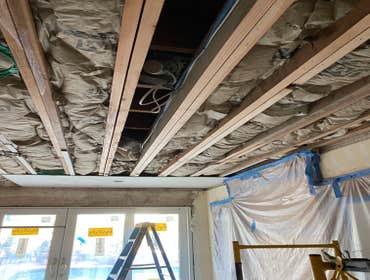 Photos by Interior Art Drywall Inc #1 Hang the walls on ceiling and walls . I just let the open on ceiling where plumbers were pending to fix the pipes