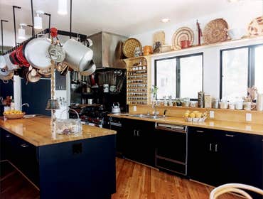 1981: Industrial Classic Kitchen Remodel This single family residence kitchen remodel entailed removal of interior wall to open kitchen up to the livin