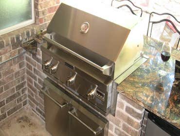 Cedar Garage Door and Backyard Kitchen
