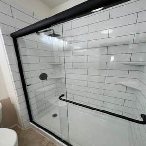 Photos by Topline Home Repair #1 Multi projects we have completed , bathroom remodels, kitchen remodels, painting hotels and trimwork, black windows