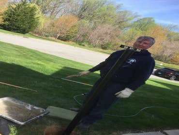 Scott installing lamppost