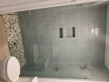 Photos by Cosmopolitan Construction and Maintenance #5 Shower conversion