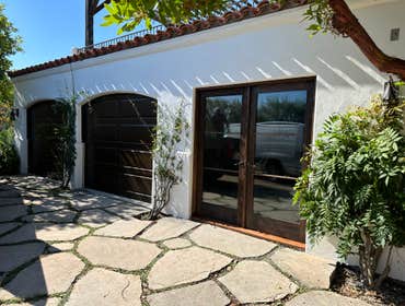 Photos by Optimum Construction Group Inc. #2 Project Description:
This custom garage door installation features a beautifully crafted design tailored t