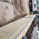 Retainer wall, fence, french drain sys., lighting,