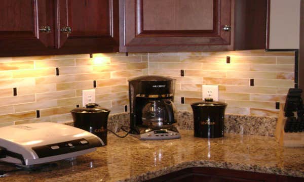 Granite Countertops with custom backsplash