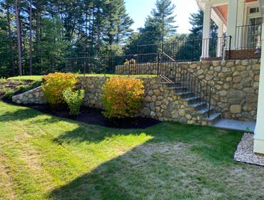 Wayland Hidden Springs Lane This is a new build construction where we did all of the masonry and hardscape work. Part of our scope was the fieldstone r