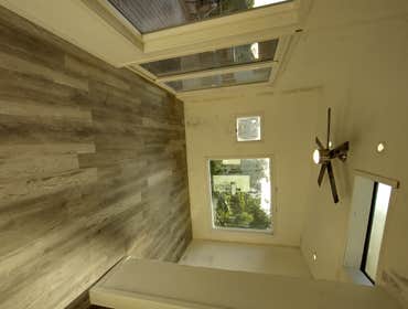Photos by Stewart & Son Gate & Fence LLC #1 Tiny House with pergola. Small house 17' by 12' small bathroom with pocket door, and small sink with water 