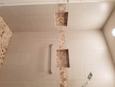 V. Jones Bathroom/Laundry Room Remodel - Tub to Step-in Shower Conversion with Linear Drain
- New Vanity, Toilet, Sink, mirror, toiletries
- All new fl