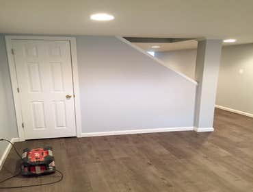 Basement remodel with Floor Plymouth We framed, wired, installed drywall, painted everything and installed the floor.