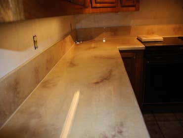 Concrete Countertop Overlay System Concrete overlay that goes right over formica,tile or any other ugly countertops to make it look like a high end sto