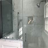 Photos by Cornerstone & Son Construction LLC #2 Shower stall remodel with subway tile, mosaic tile, accent tile and recessed shampoo shelf. Bathroom f