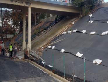 Photos by Margarella Industrial Con #1 Before and After of a Newly Installed Retainer Wall