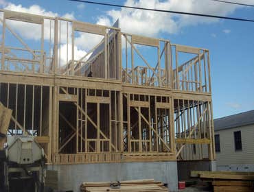 Photos by Teagan Homes #1 New construction of two townhomes sold to individuals for about $450000 each unit. Profit margin was over $250,000 in less th