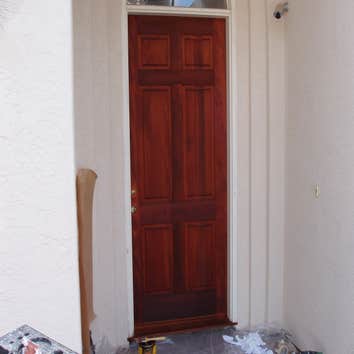 Chris Matthews Painting Project Exterior painting of two-story home and exterior wall fence, staining of deck, stairways and doors. San Diego, CA