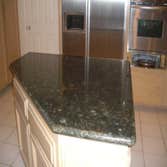 Kitchen Remodeling in H.B. Ca We replaced the Kitchen tiles , also put new granite counter tops and bathroom counter tops.