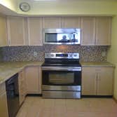 Glass tile backsplash.