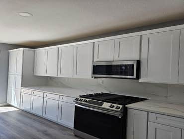 Fine Design Remodeling resume painting, frame, tile, cabinet install, shower, more.
