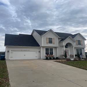 New roof in Lenexa, KS using Tamko Titan in rustic black