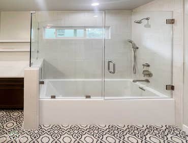 Woodland Hills Bathroom Remodel We turned this Woodland Hills bathroom into your timeless, elegant escape! Imagine a deep brown vanity with silver hand