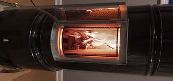 Photos by Grz LLC #2 Masonry Heater, Stove is a modern heat-storing and metal plated fireplace that represents classic Scandinavian design. With an eff