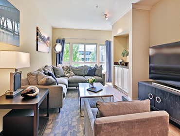 Kirkland Condo Selected, purchased, and installed all furnishings, art, lighting, accessories, bedding, and rugs.